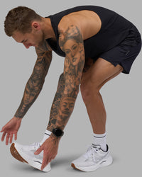 Man wearing Pace Running Tank - Black | Model:Tommy | Size:M