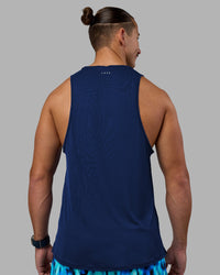 Man wearing Pace Running Tank - Midnight Blue | Model:Jaiden | Size:M