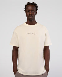 Man wearing Peaches x LSKD Collection FLXCotton Oversize Tee - Off White | Model:Okello | Size:M