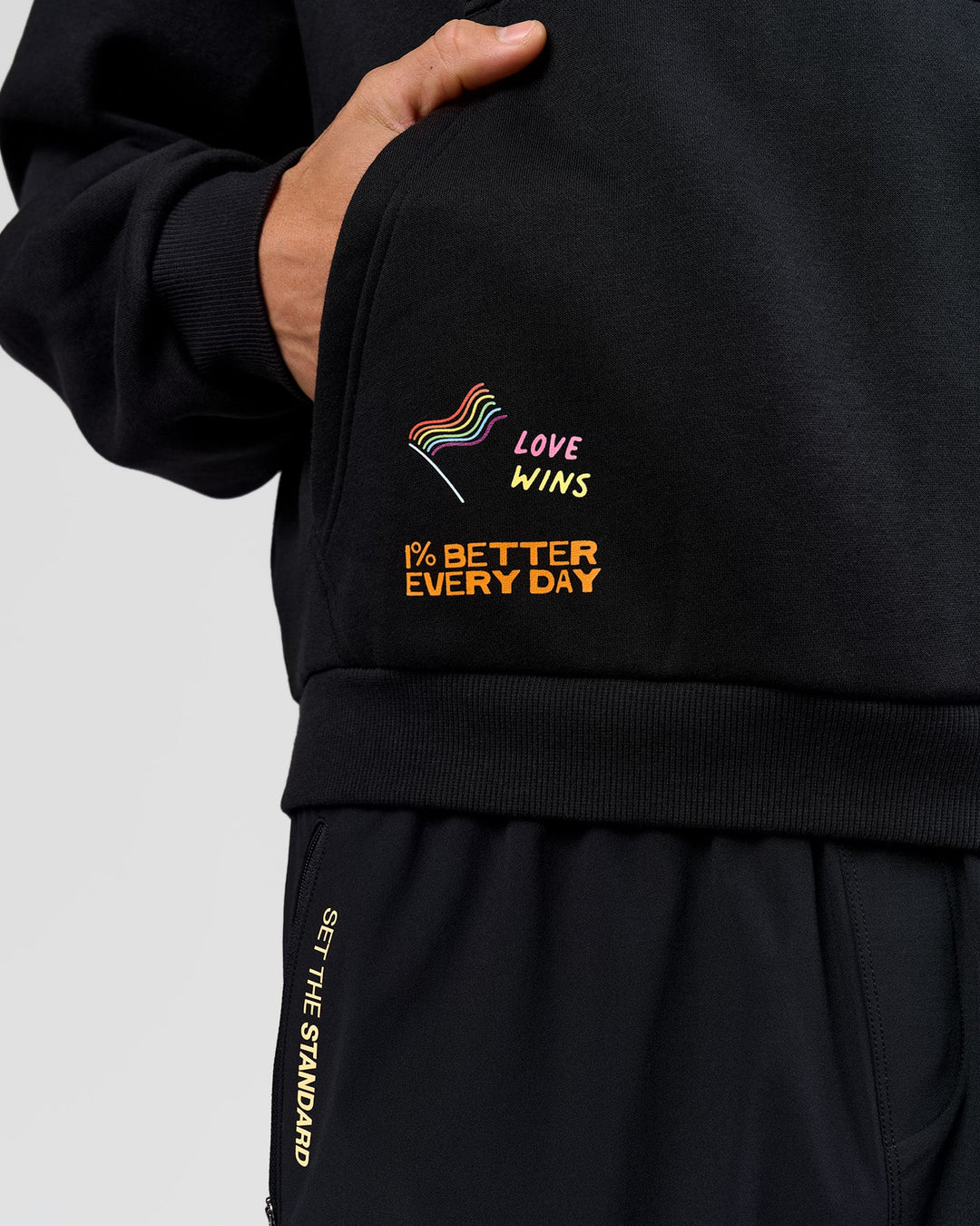 Man wearing Pride Sticker Boxy Hoodie - Black | Model:Albert | Size:M