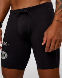Man wearing Race Day 8" Short Tight - Black-Alloy | Model:Malebo | Size:M