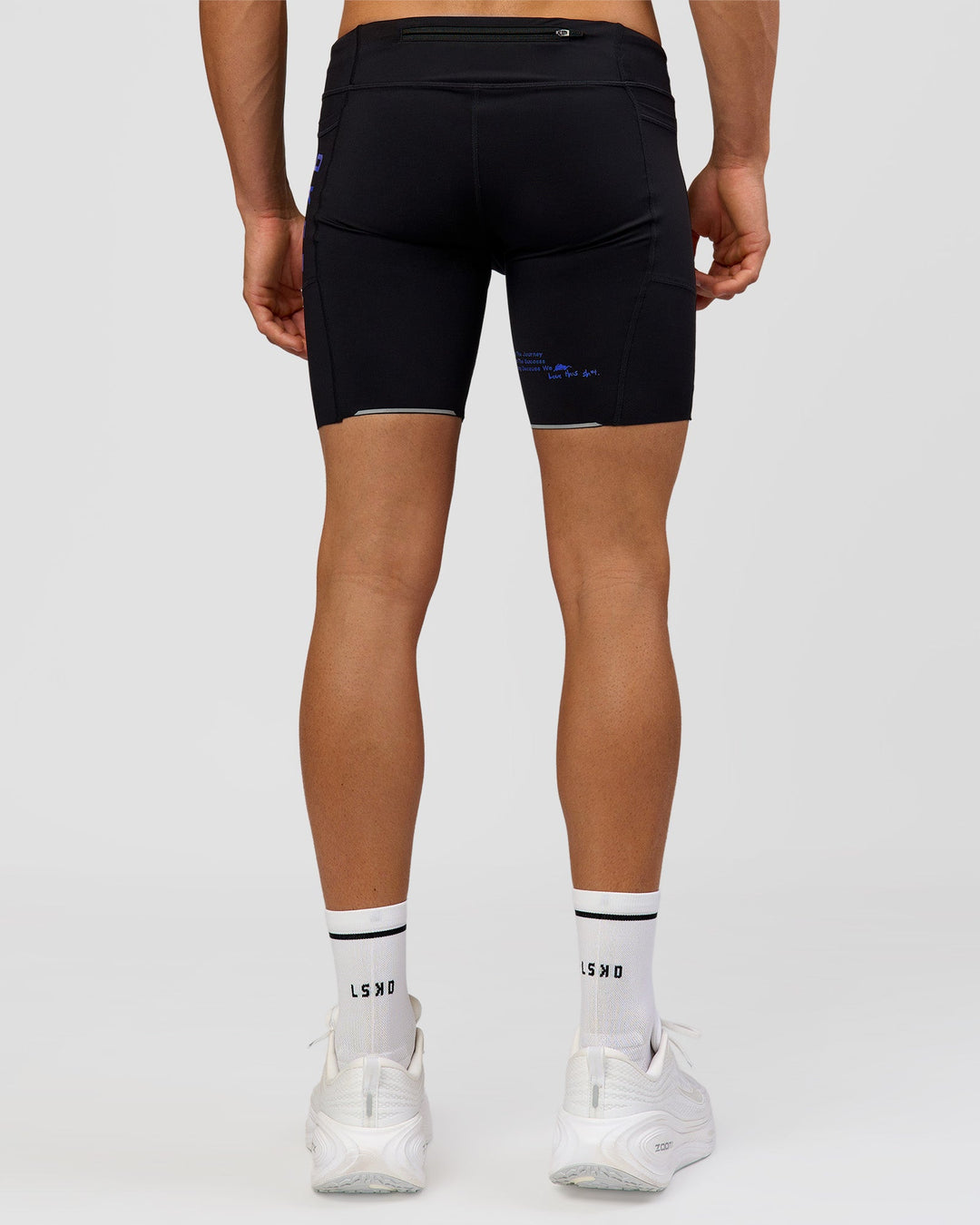 Man wearing Race Day 8" Short Tight - Black-Electric Indigo | Model:Albert | Size:M |