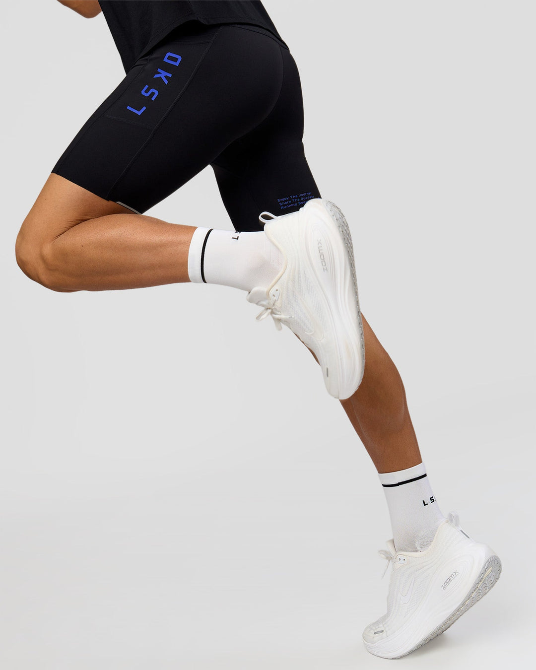 Man wearing Race Day 8" Short Tight - Black-Electric Indigo | Model:Albert | Size:M |