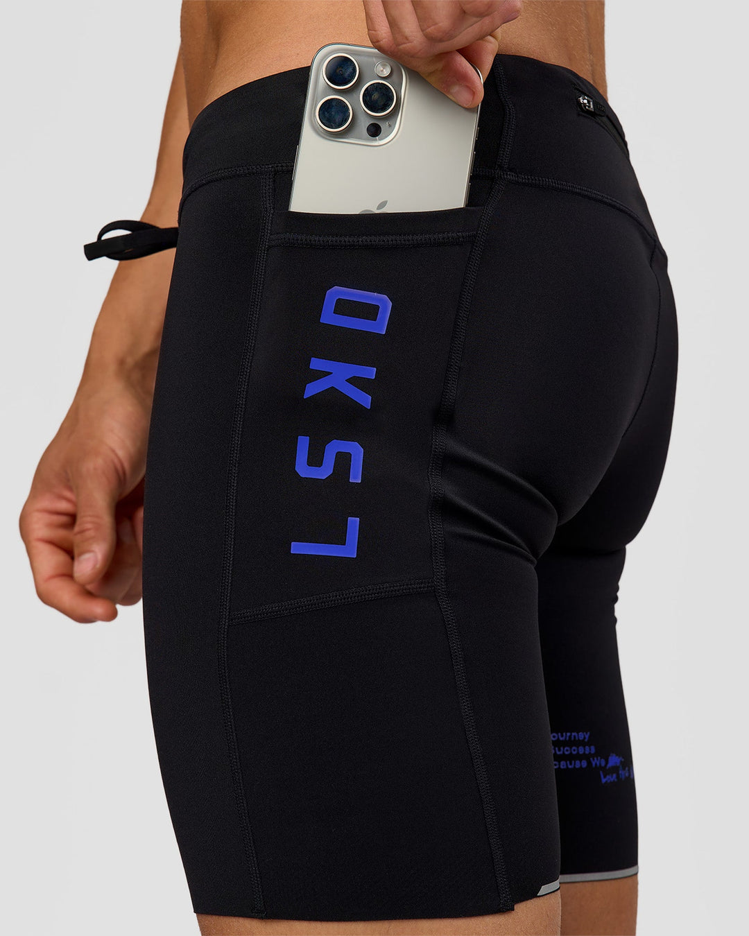 Man wearing Race Day 8" Short Tight - Black-Electric Indigo | Model:Albert | Size:M |