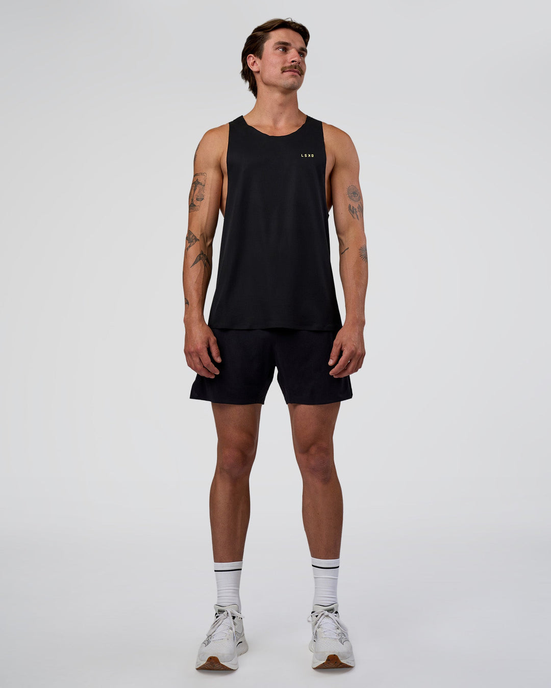 Man wearing Race Day Tank - Black-Yellow Fizz | Model:Konnor | Size:M