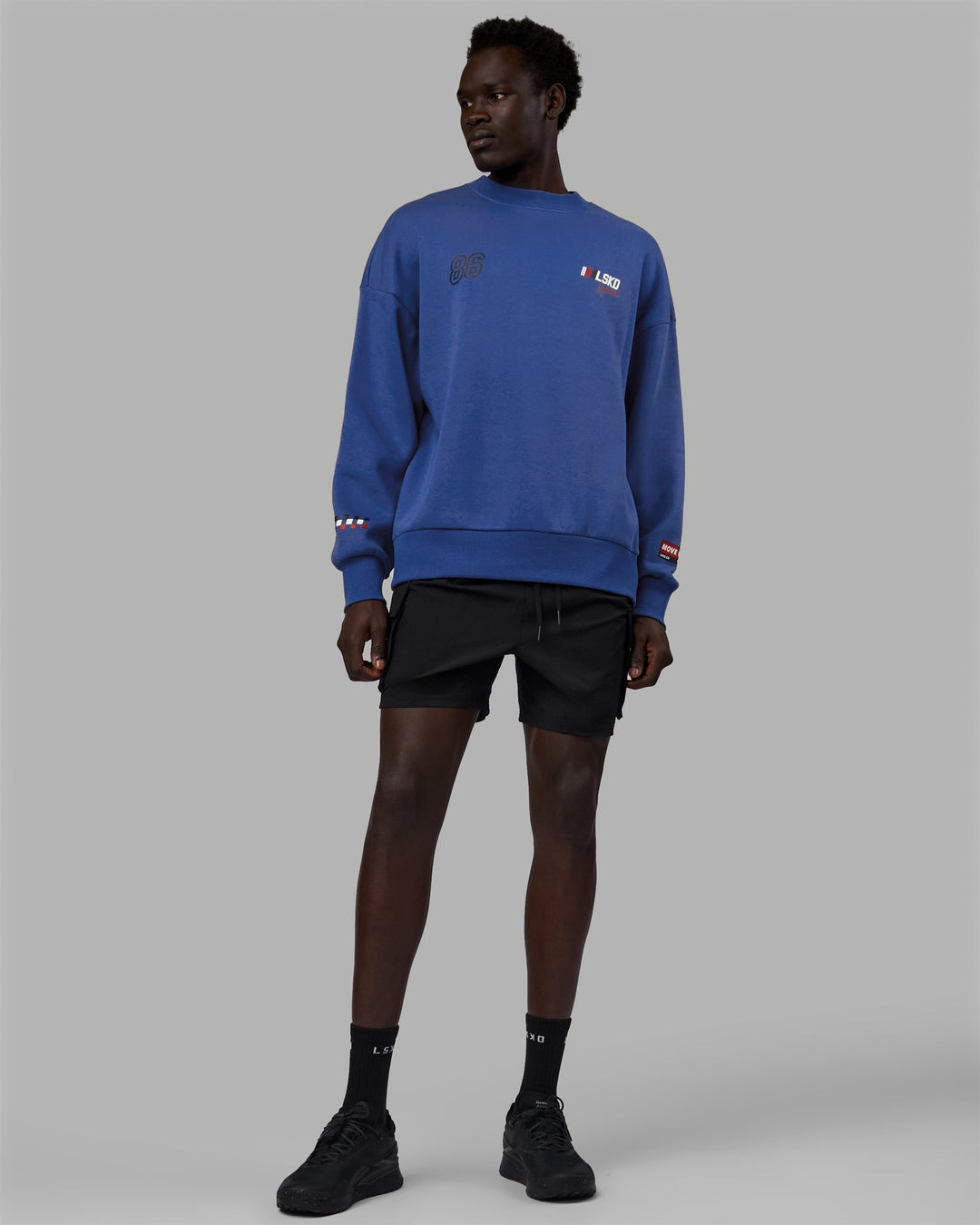 Man wearing Unisex Redline Sweater Oversize - Power Cobalt-White