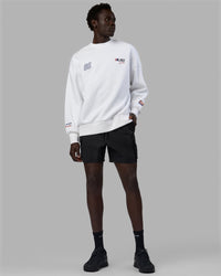 Man wearing Unisex Redline Sweater Oversize - White-Navy
