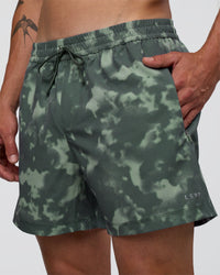 Man wearing Rep 5" Performance Short - Washed Camo Carbon | Model:Konnor | Size:M