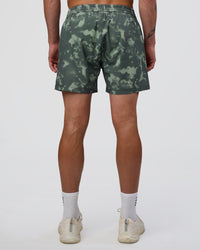 Man wearing Rep 5" Performance Short - Washed Camo Carbon | Model:Konnor | Size:M