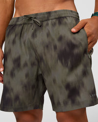 Man wearing Rep 7" Performance Short - Camo Washed Walnut Grey | Model:George | Size:M