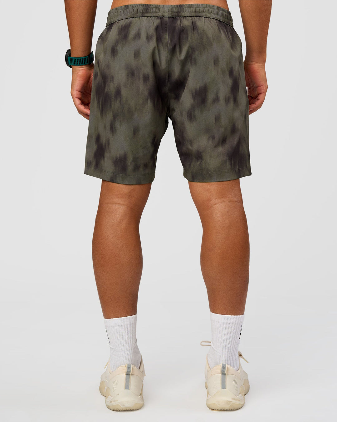 Man wearing Rep 7" Performance Short - Camo Washed Walnut Grey | Model:George | Size:M