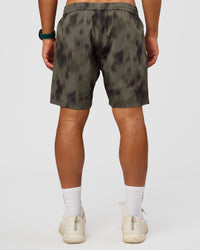 Man wearing Rep 7" Performance Short - Camo Washed Walnut Grey | Model:George | Size:M