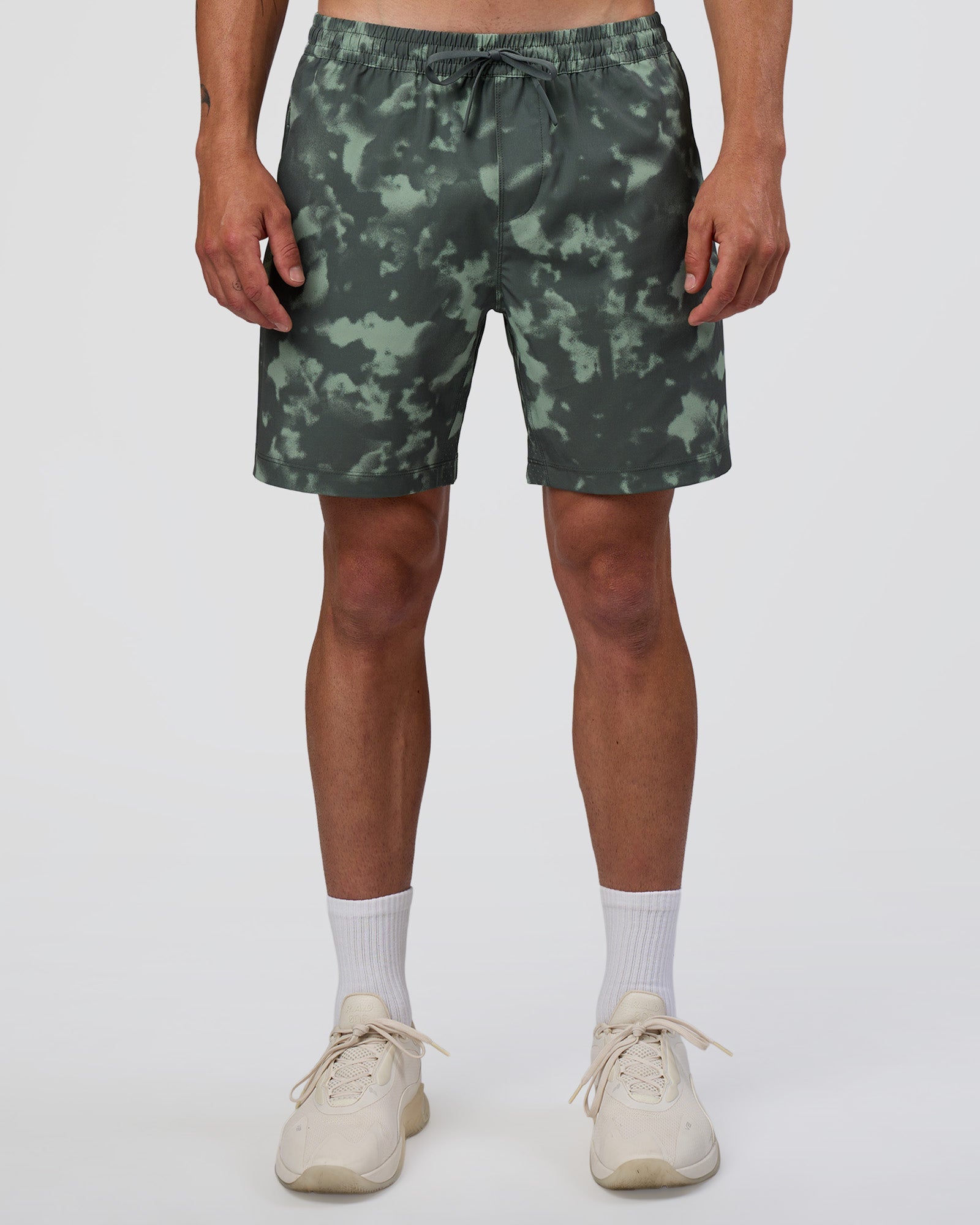 Man wearing Rep 7'' Performance Short - Washed Camo Carbon | Model:Konnor | Size:M