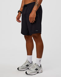 Man wearing Rep 9'' Training Short - Black | Model:Malebo | Size:M