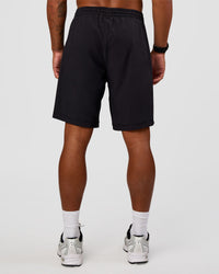 Man wearing Rep 9'' Training Short - Black | Model:Malebo | Size:M