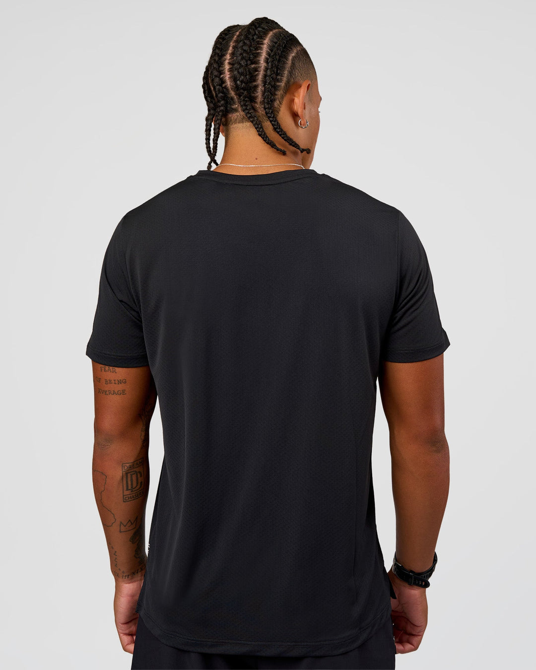 Man wearing Rep Training Tee - Black | Model:Malebo | Size:M