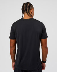 Man wearing Rep Training Tee - Black | Model:Malebo | Size:M