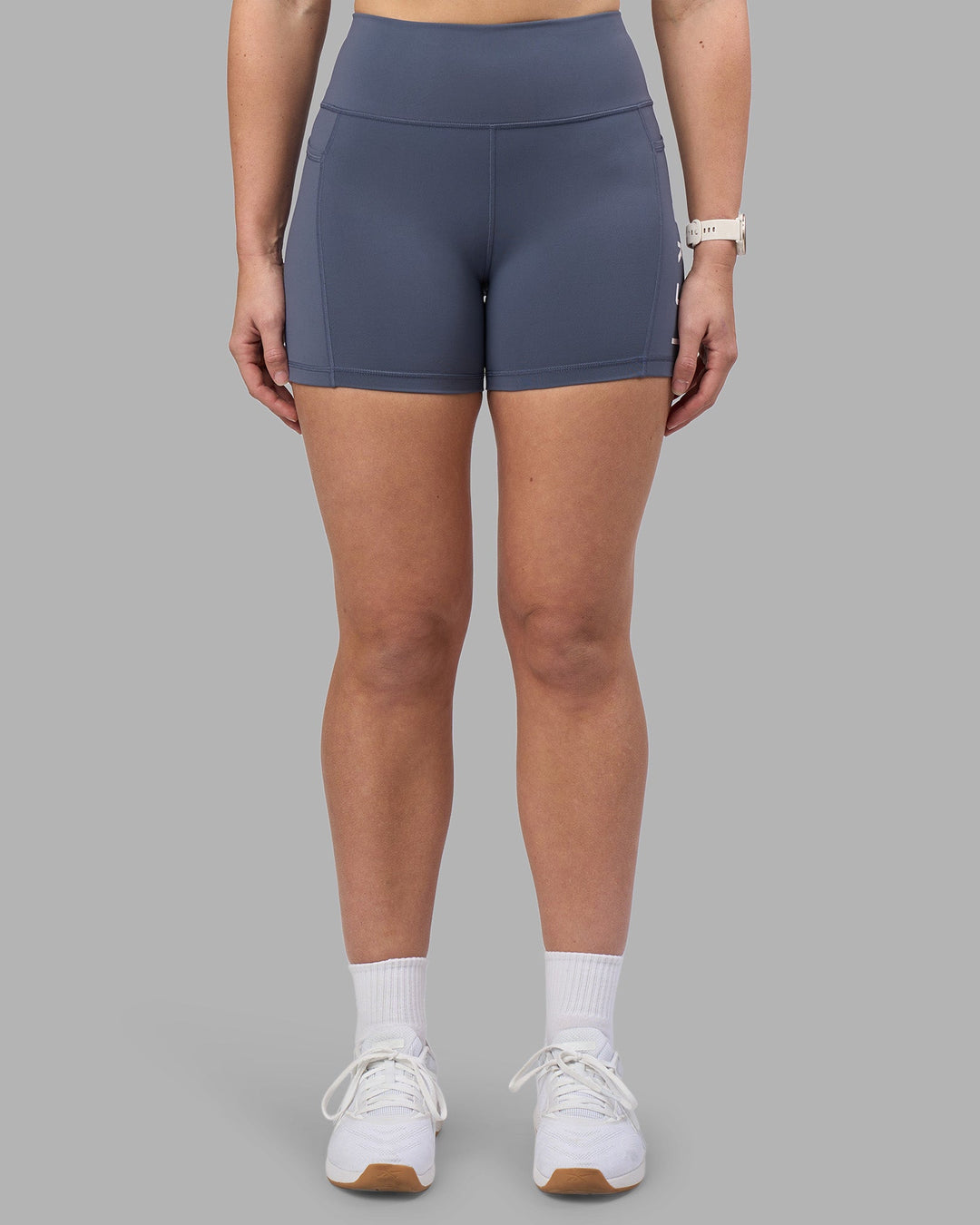 Woman wearing Rep Ultra High-Rise 4&quot; Short Pockets - Night Shadow-White | Model:Amy | Size:M