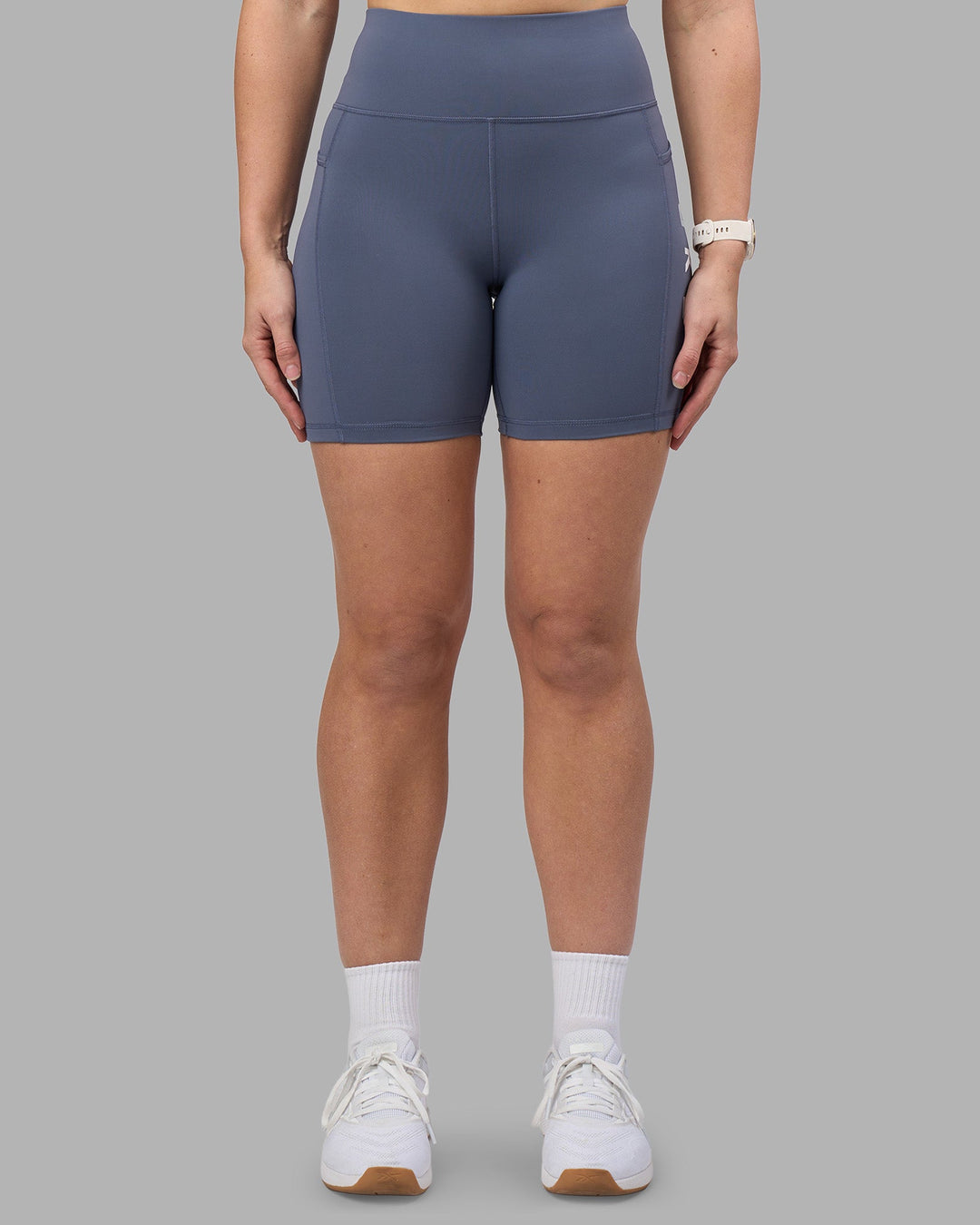 Woman wearing Rep Ultra High-Rise 6&quot; Short Pockets - Night Shadow-White | Model:Amy | Size:M