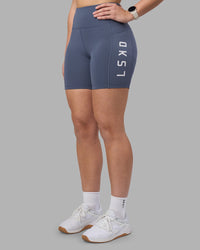 Woman wearing Rep Ultra High-Rise 6" Short Pockets - Night Shadow-White | Model:Amy | Size:M