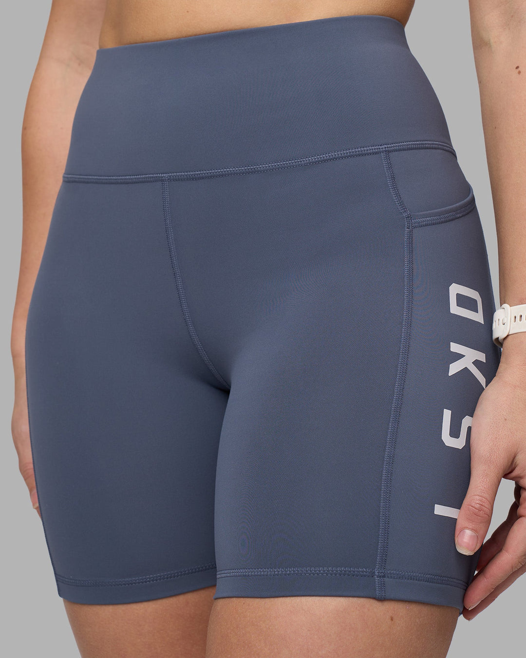 Woman wearing Rep Ultra High-Rise 6&quot; Short Pockets - Night Shadow-White | Model:Amy | Size:M