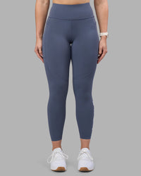 Woman wearing Rep Ultra High-Rise 7/8 Legging Pockets - Night Shadow-White | Model:Amy | Size:M