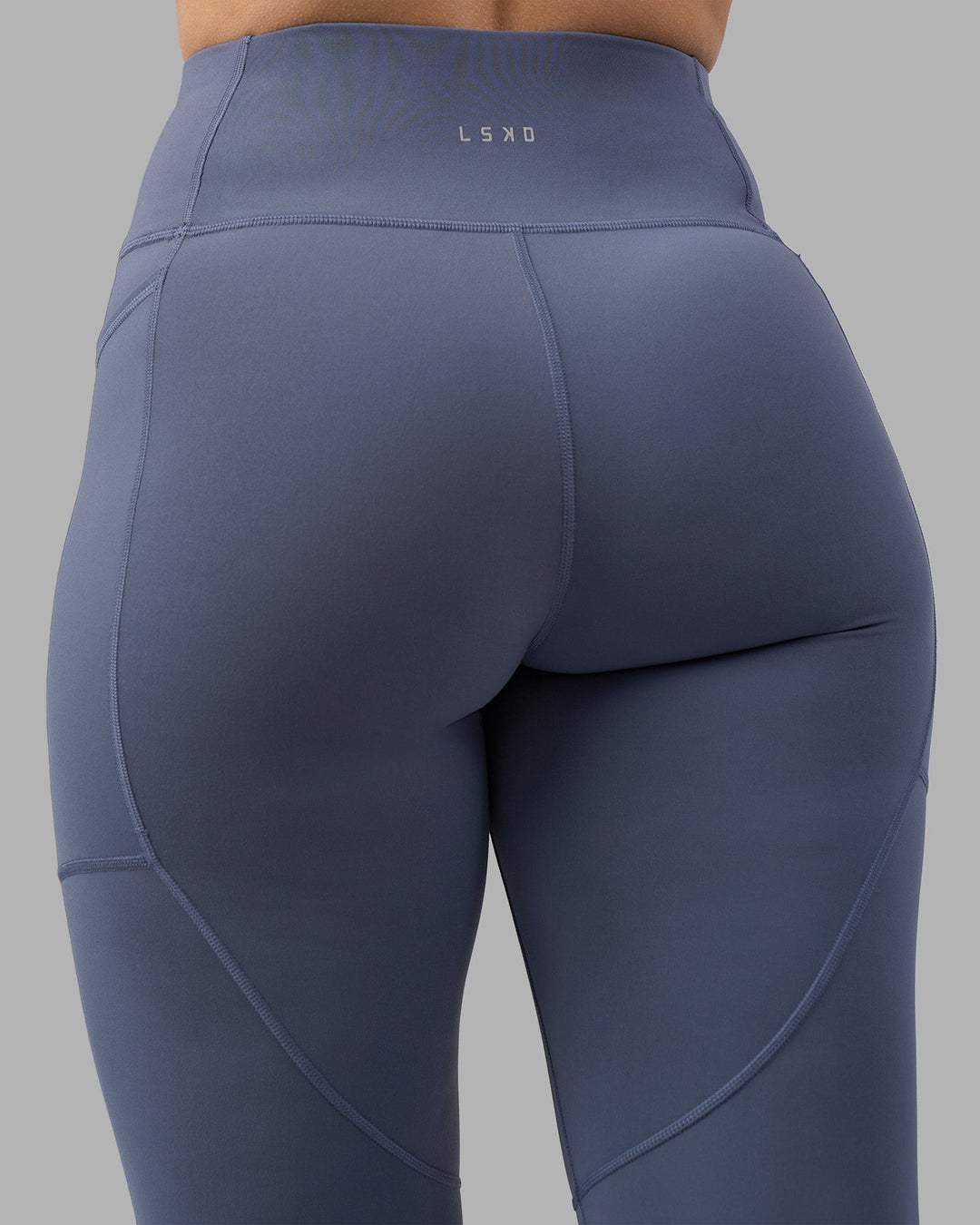 Woman wearing Rep Ultra High-Rise 7/8 Legging Pockets - Night Shadow-White | Model:Amy | Size:M