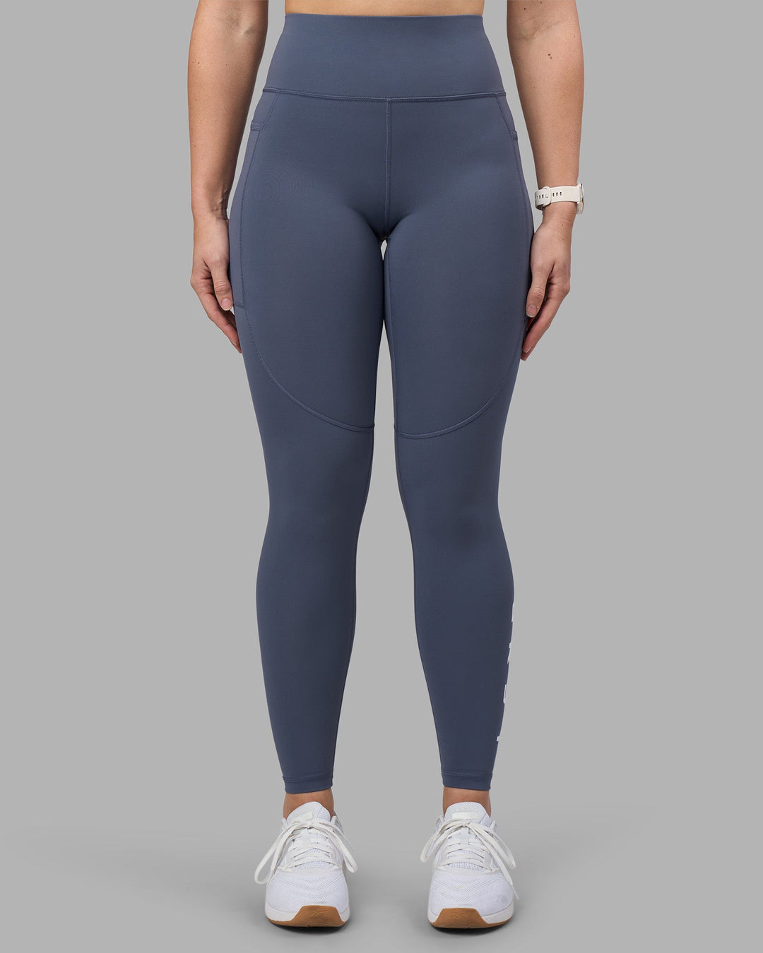 Woman wearing Rep Ultra High-Rise Full Length Legging Pockets - Night Shadow-White | Model:Amy | Size:M