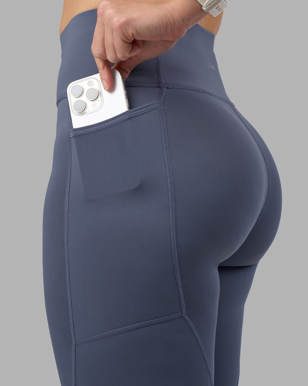 Woman wearing Rep Ultra High-Rise Full Length Legging Pockets - Night Shadow-White | Model:Amy | Size:M