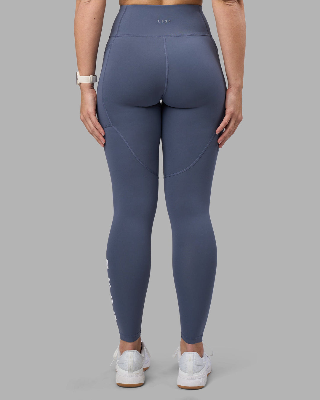 Woman wearing Rep Ultra High-Rise Full Length Legging Pockets - Night Shadow-White | Model:Amy | Size:M