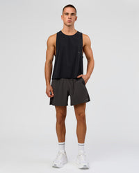 Man wearing Run Club Elevate Pace Running Tank - Black-Onyx | Model:Albert | Size:M