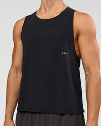 Man wearing Run Club Elevate Pace Running Tank - Black-Onyx | Model:Albert | Size:M