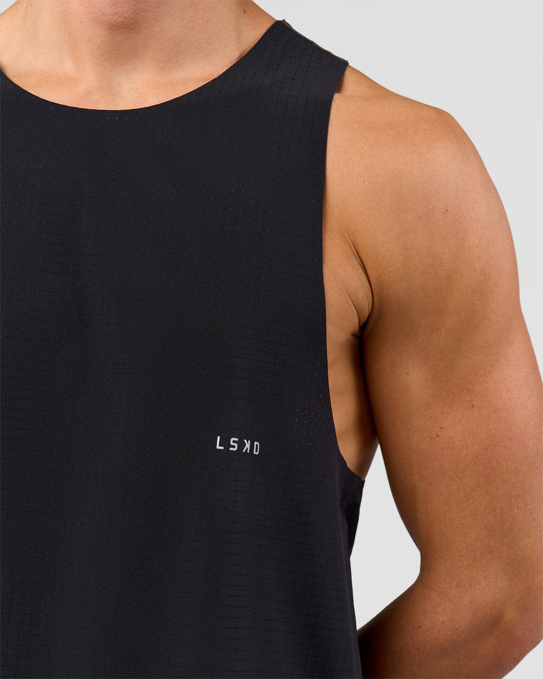 Man wearing Run Club Elevate Pace Running Tank - Black-Onyx | Model:Albert | Size:M