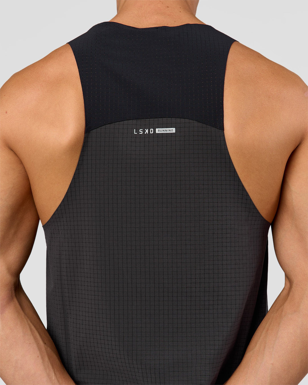 Man wearing Run Club Elevate Pace Running Tank - Onyx-Black | Model:Albert | Size:M