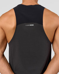 Man wearing Run Club Elevate Pace Running Tank - Onyx-Black | Model:Albert | Size:M