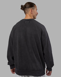 Man wearing Segmented Oversized Sweater - Black Washed | Model:Jaiden | Size:M
