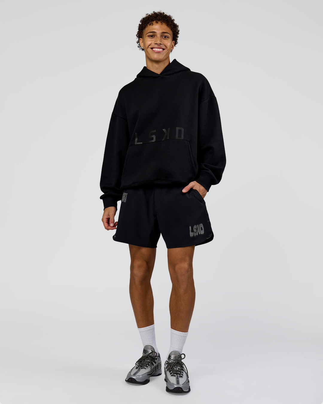 Man wearing Shadow Mode Oversized Hoodie - Black | Model:Leandro | Size:M - view 3