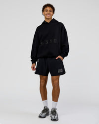 Man wearing Shadow Mode Oversized Hoodie - Black | Model:Leandro | Size:M | Thumbnail Index: 2