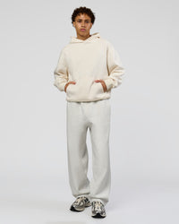 Man wearing Shadow Mode Oversized Hoodie - Off White | Model:Leandro | Size:M