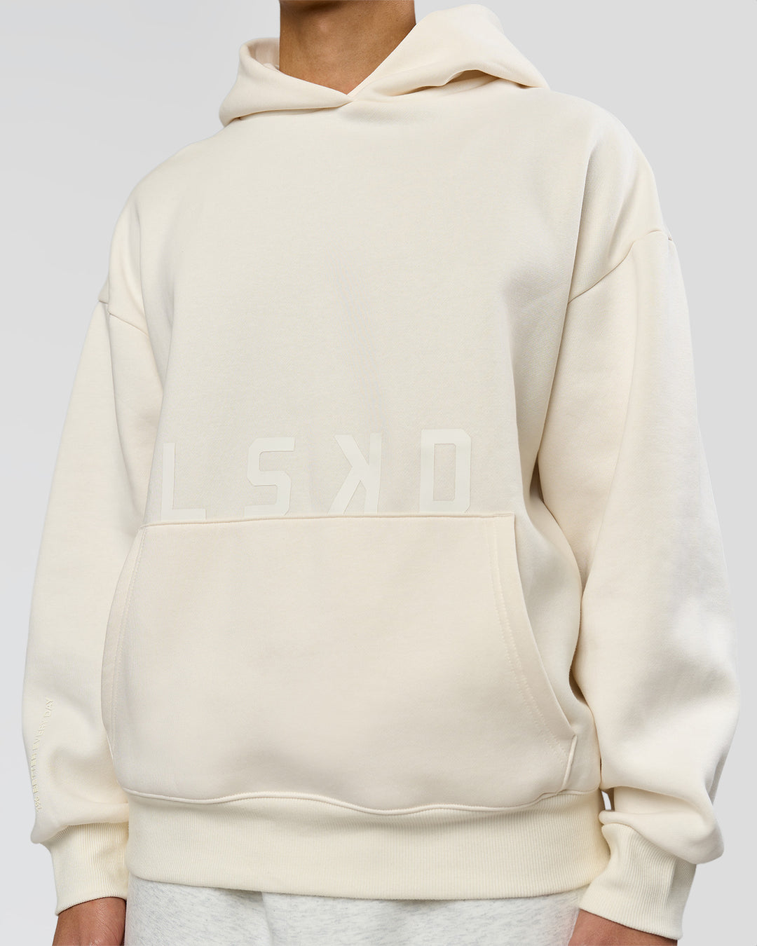 Man wearing Shadow Mode Oversized Hoodie - Off White | Model:Leandro | Size:M