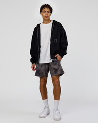 Man wearing Shadow Mode Oversized Zip Through Hoodie - Black | Model:Leandro | Size:M
