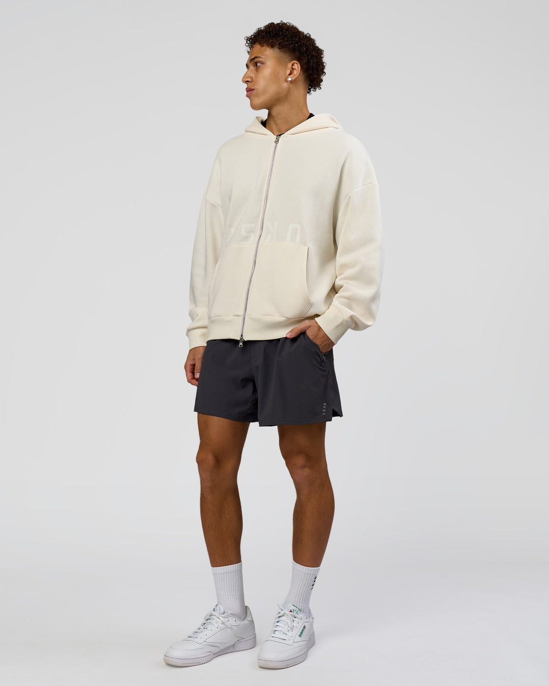 Man wearing Shadow Mode Oversized Zip Through Hoodie - Off White | Model:Leandro | Size:M - view 11