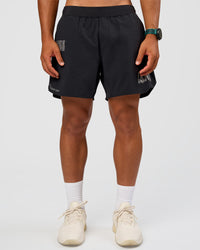 Man wearing Static Grit Lift 6" Short - Black-Alloy | Model:George | Size:M
