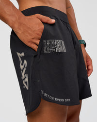 Man wearing Static Grit Lift 6" Short - Black-Alloy | Model:George | Size:M