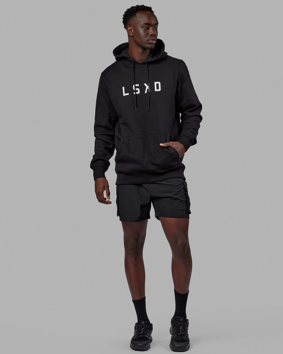 Man wearing Unisex Structure Hoodie - Black-White