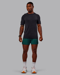 Man wearing UltraAir 5" Lined Performance Short in Dark Moss | Size:M