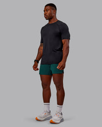 Man wearing UltraAir 5" Lined Performance Short in Dark Moss | Size:M