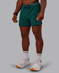 Man wearing UltraAir 5" Lined Performance Short in Dark Moss | Size:M