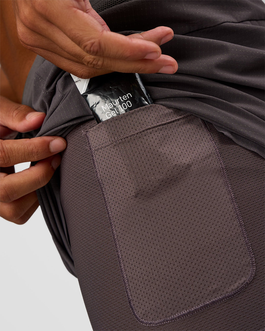 Man wearing UltraAir 5" Lined Performance Short - Duskstone | Model:Malebo | Size:M