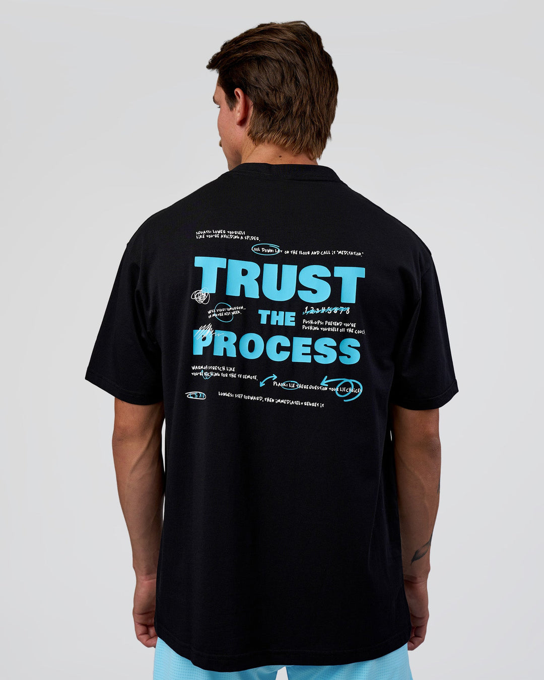 Man wearing Unfit Club FLXCotton Oversized Tee - Black-White | Model:Konnor | Size:M